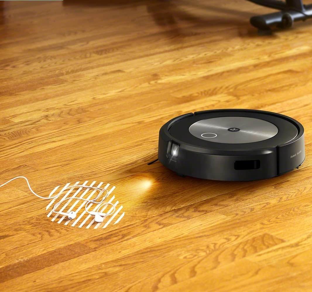 iRobot Roomba j7 cleaning on hardwood floor